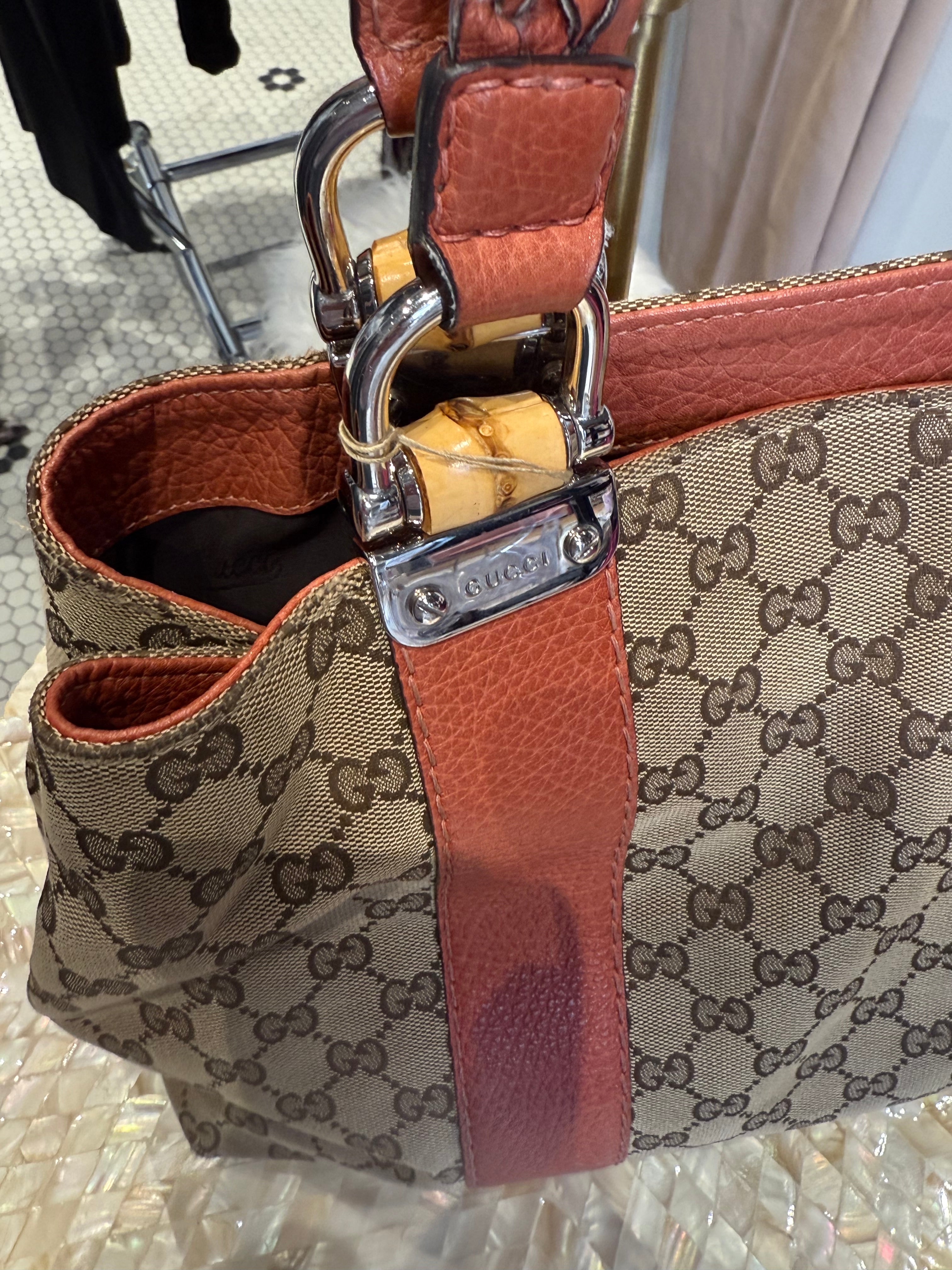 Vintage Gucci handbag with orange leather trim