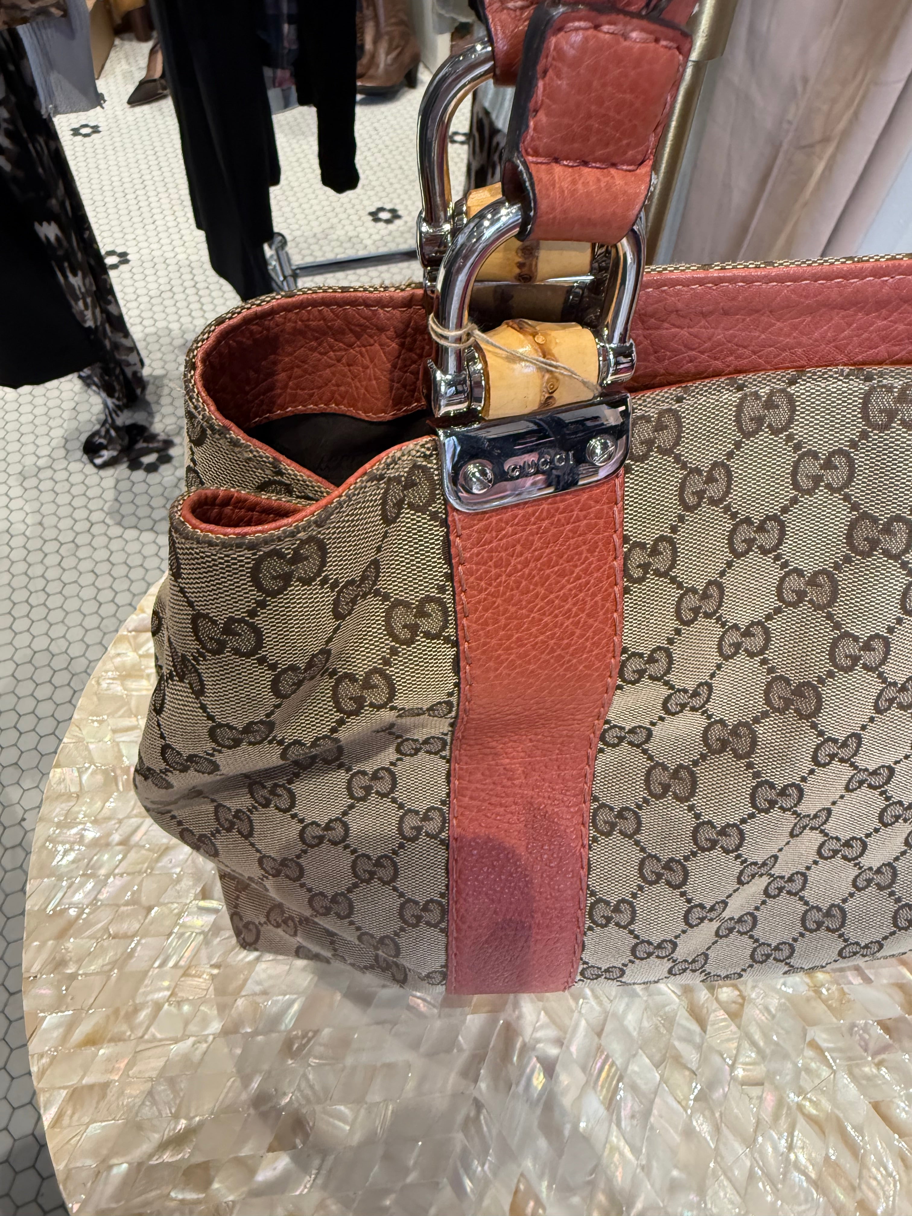Vintage Gucci handbag with orange leather trim